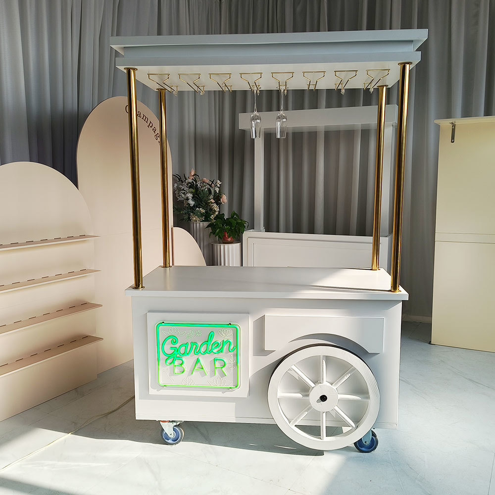 Champagne cart with neon sign