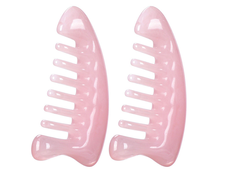Triangular massage comb