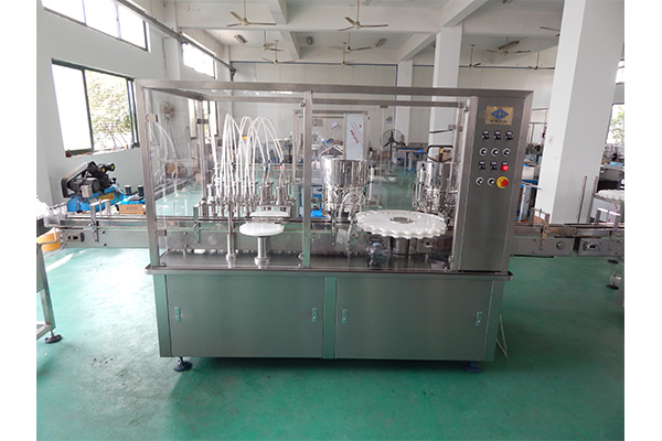 12 nozzles Filling and 2 heads Stoppering Machine