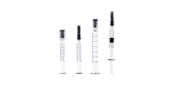 Prefillable syringe with scale