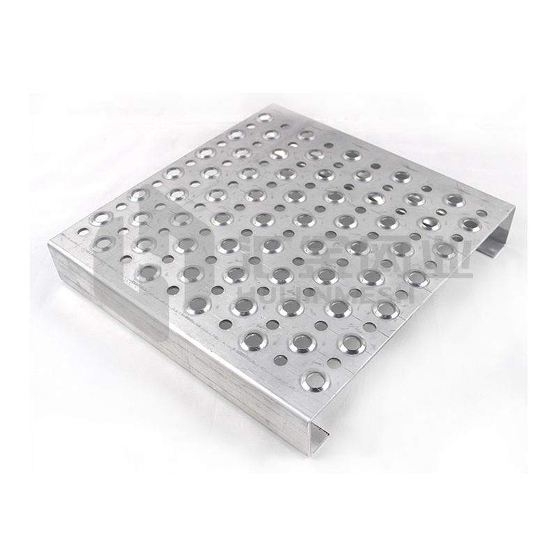TRACTION TREAD flooring feature a surface with hundreds of perforated buttons that provide slip- resistance in all directions making it a practical choice