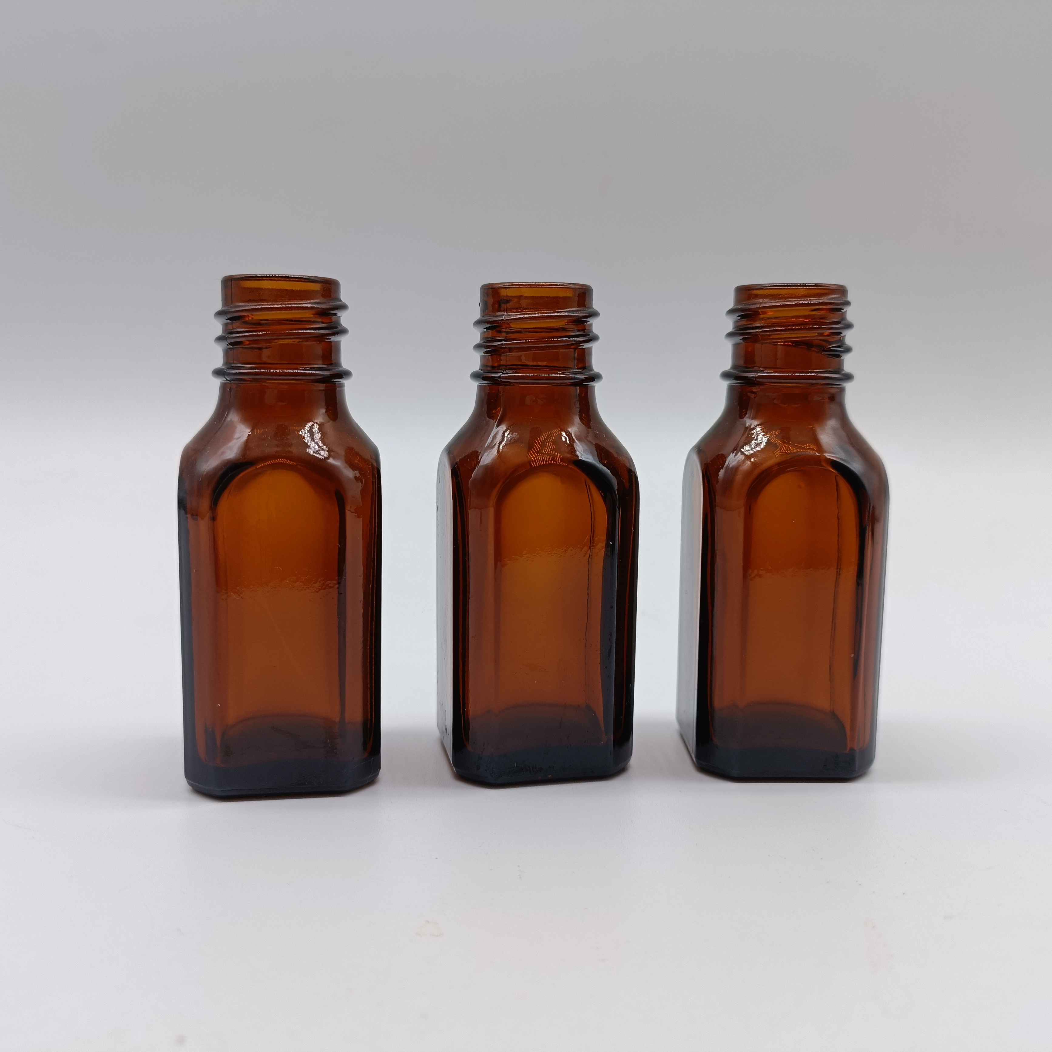Spotly wholesale medical dark-colored original liquid essence oral liquid empty bottles medicinal oil glass bottles