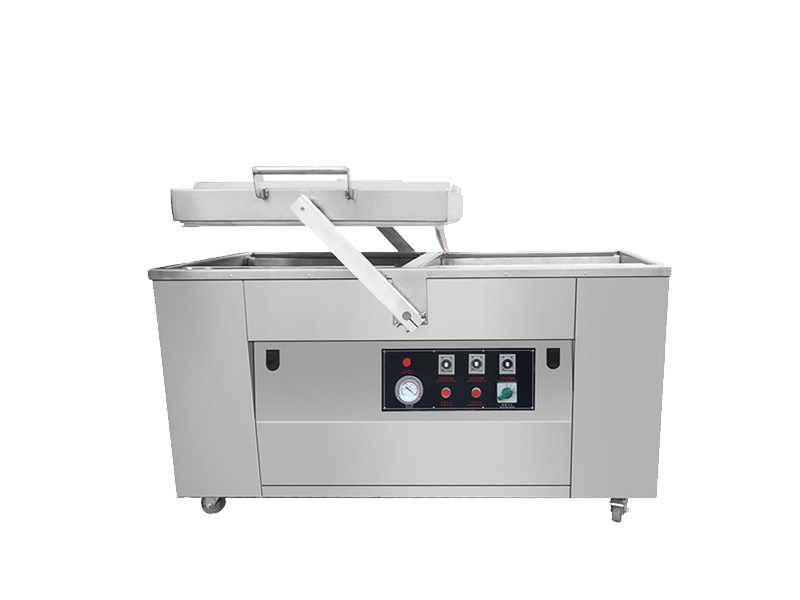 Double chamber vacuum packaging machine