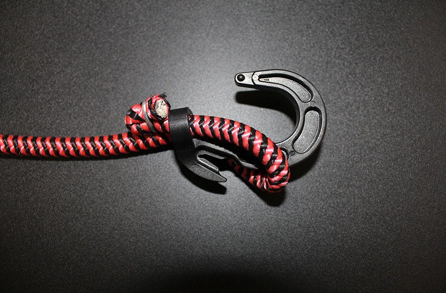 An adjustable drawstring with a hook