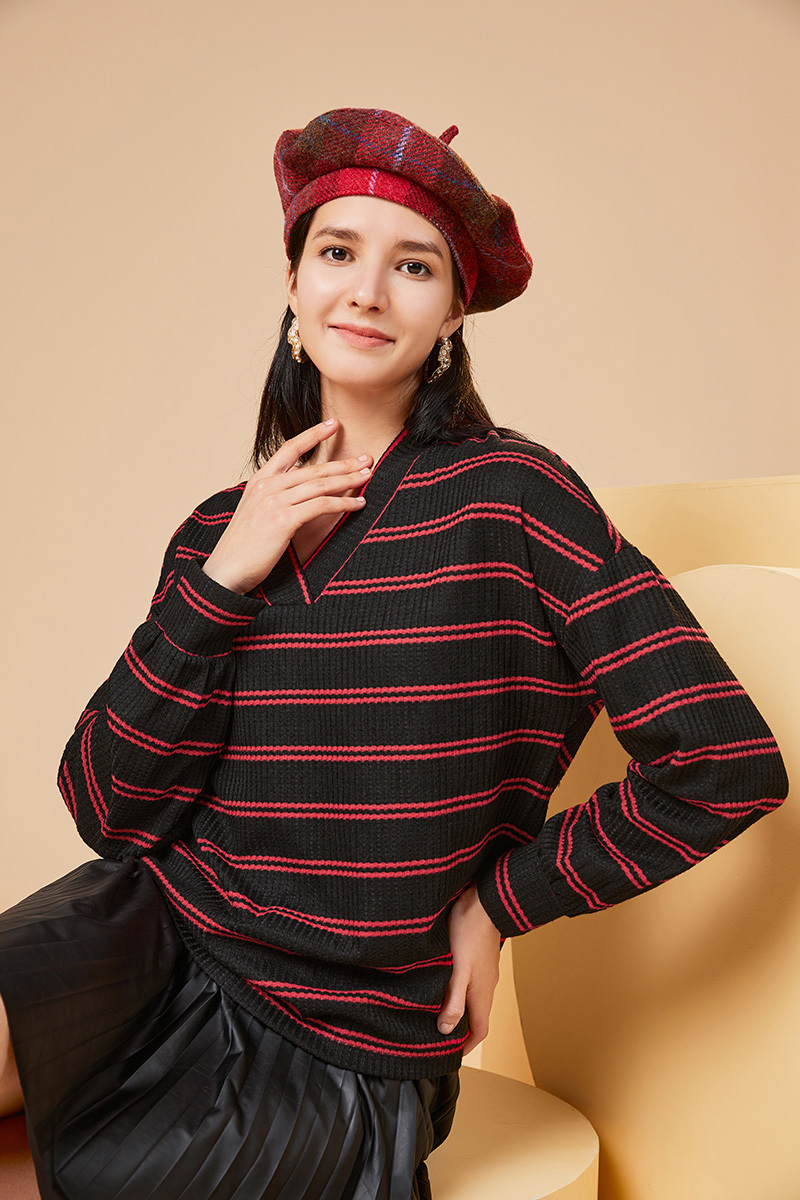 SWEATERS