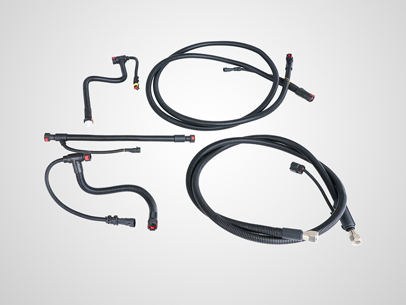 The outer protection method of automobile wiring harness usually uses threaded plastic corrugated pipe