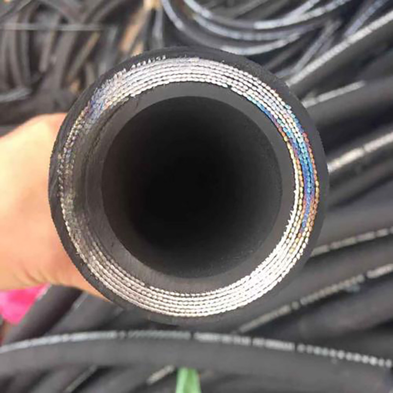 Excavator entangled hose
