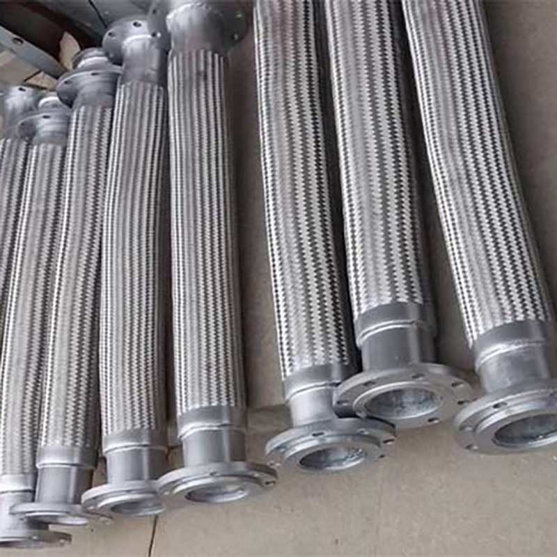 Flexible metal hose for storage tanks
