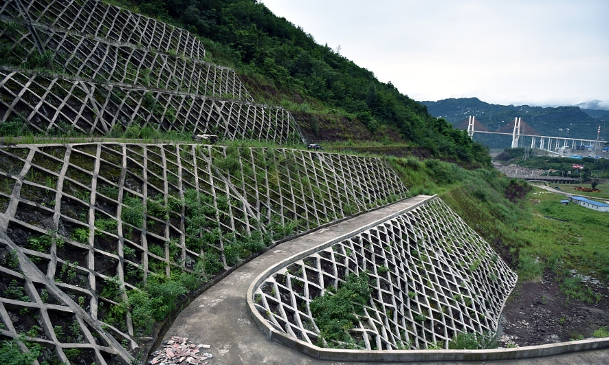 What instruments and equipment are used for high slope displacement monitoring?