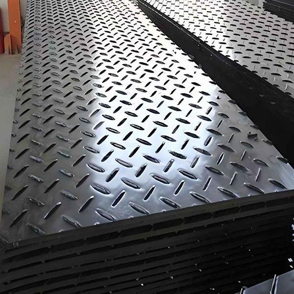 Temporary paving pad for construction site