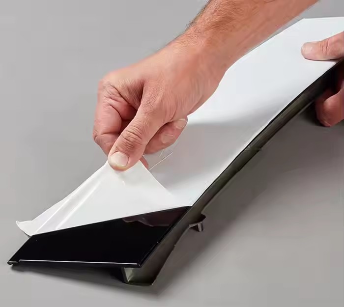 Non-traditional protective film for fingerprint-resistant surfaces
