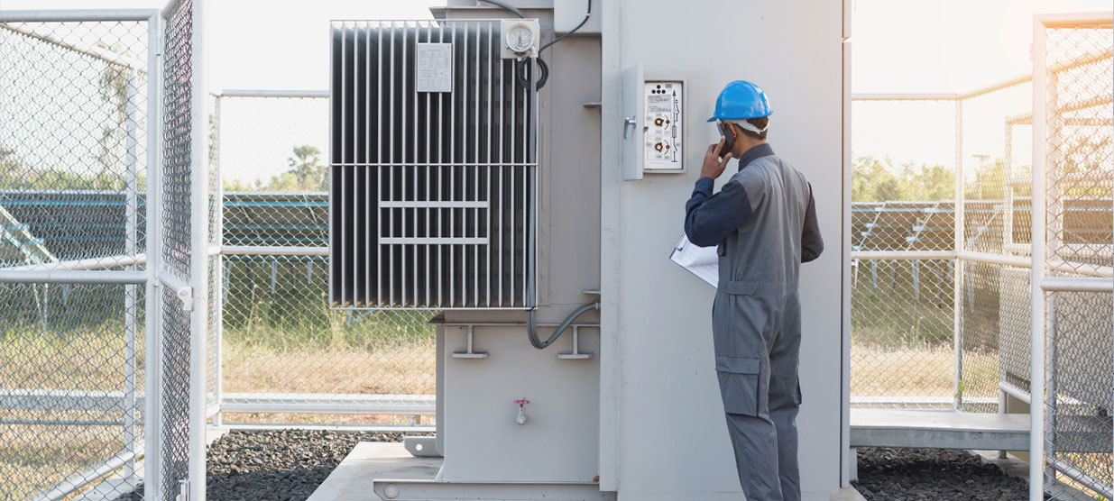 What are the functions of a power transformer?