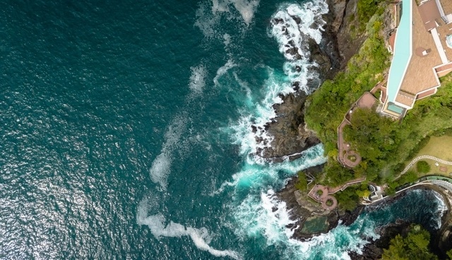 Why is the distance at sea described in nautical miles?