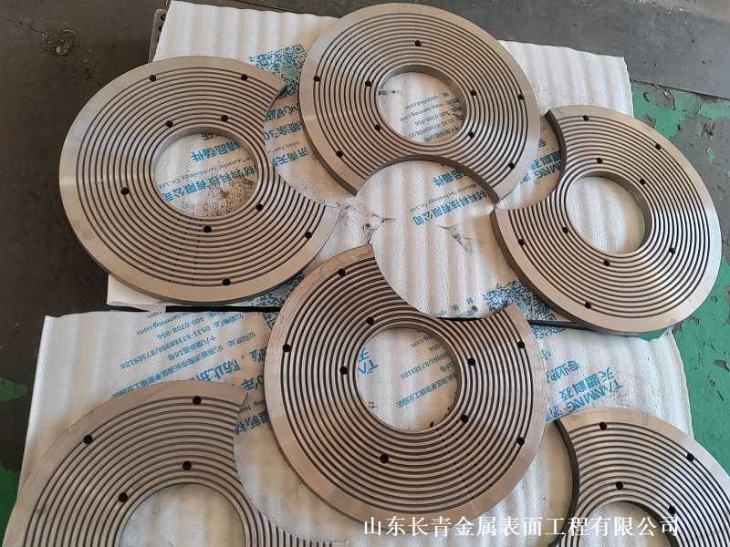 長青金屬熱噴涂公司工作臺板防護(hù)熱噴涂技術(shù)的解決方案
