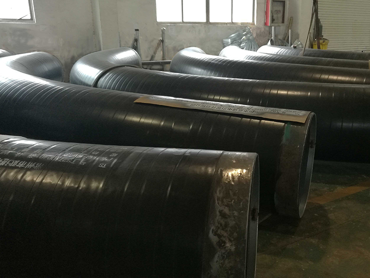 Double-layer fusion-bonded epoxy powder coating for corrosion protection + wrapped bend pipe