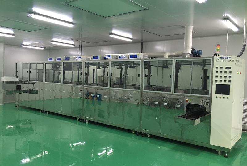 Fully automatic ultrasonic cleaning and drying system for optical parts