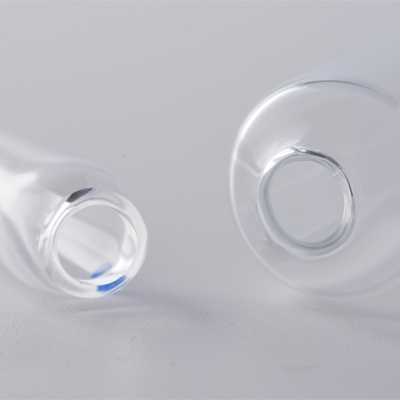 10ml D-shaped mouth clear neutral borosilicate glass vial for pharmaceutical packaging, featuring blue dots that are easy to fold 10ml D-shaped mouth clear neutral borosilicate glass vial for pharmaceutical packaging, featuring blue dots that are easy to fold