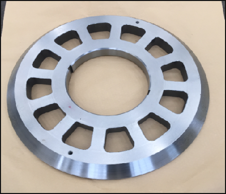 Stator pressing plate at drive end